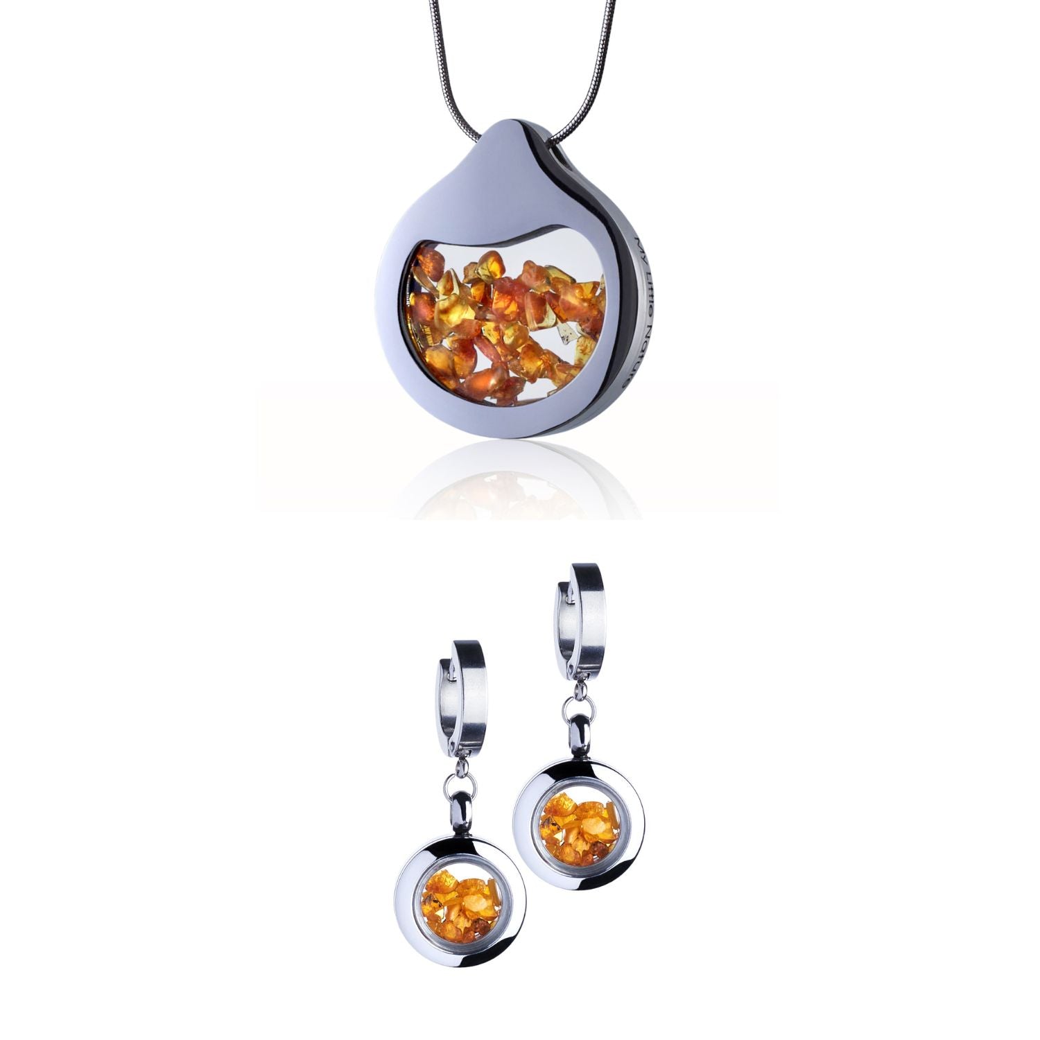 Amber Jewelry Set with a designer necklace by Barbora-Adamonyte Keidune and dangle huggie earrings in stainless steel, featuring amber stones under glass. Inspired by nature after a rainfall, symbolizing eternal love and passion.