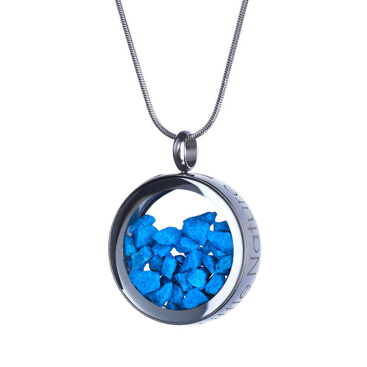 Handmade magnified blue stones necklace featuring genuine blue stones under a glass lens, symbolizing resilience, strength, and inner power. Nature-inspired jewelry piece