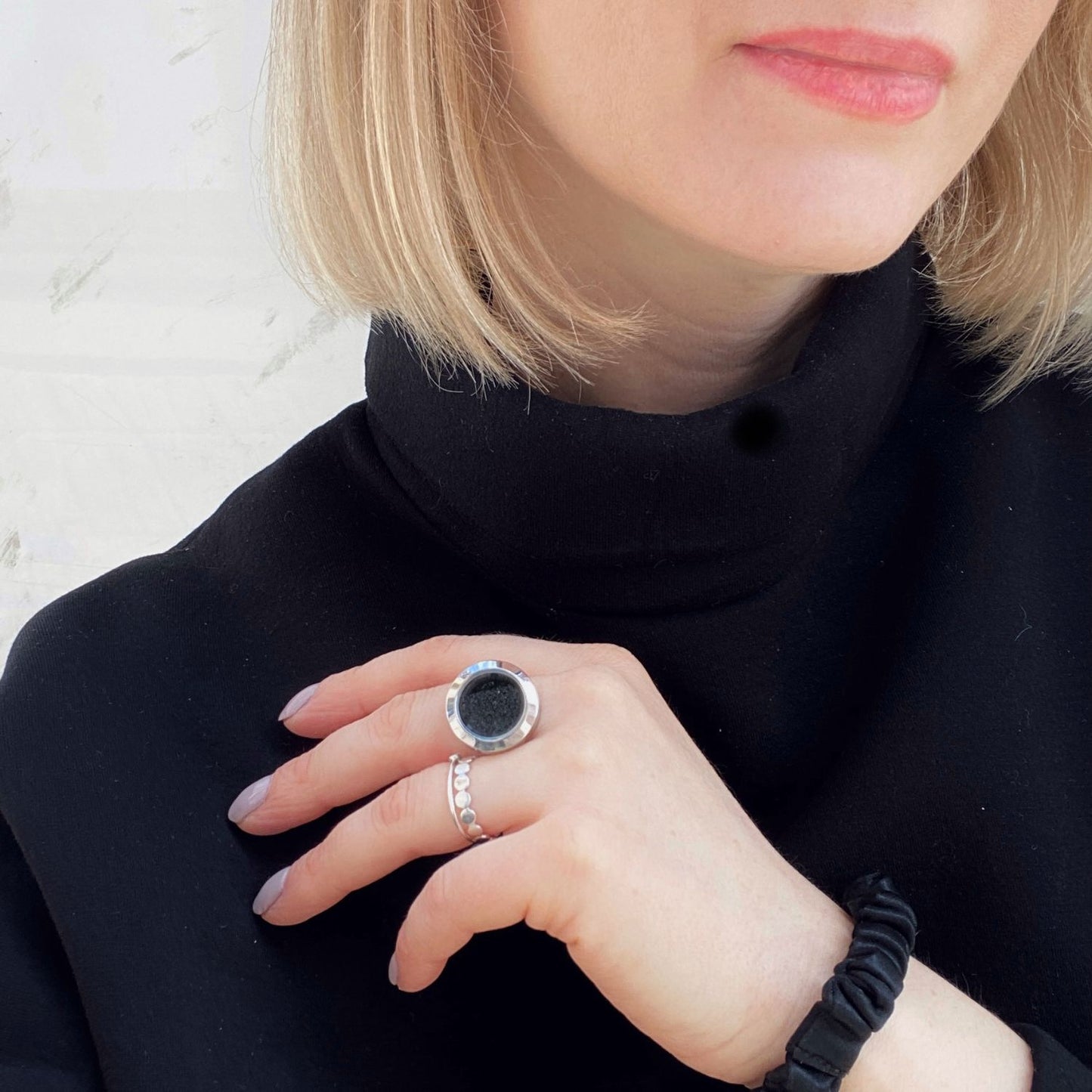 Handmade statement ring with real volcanic on model  finger