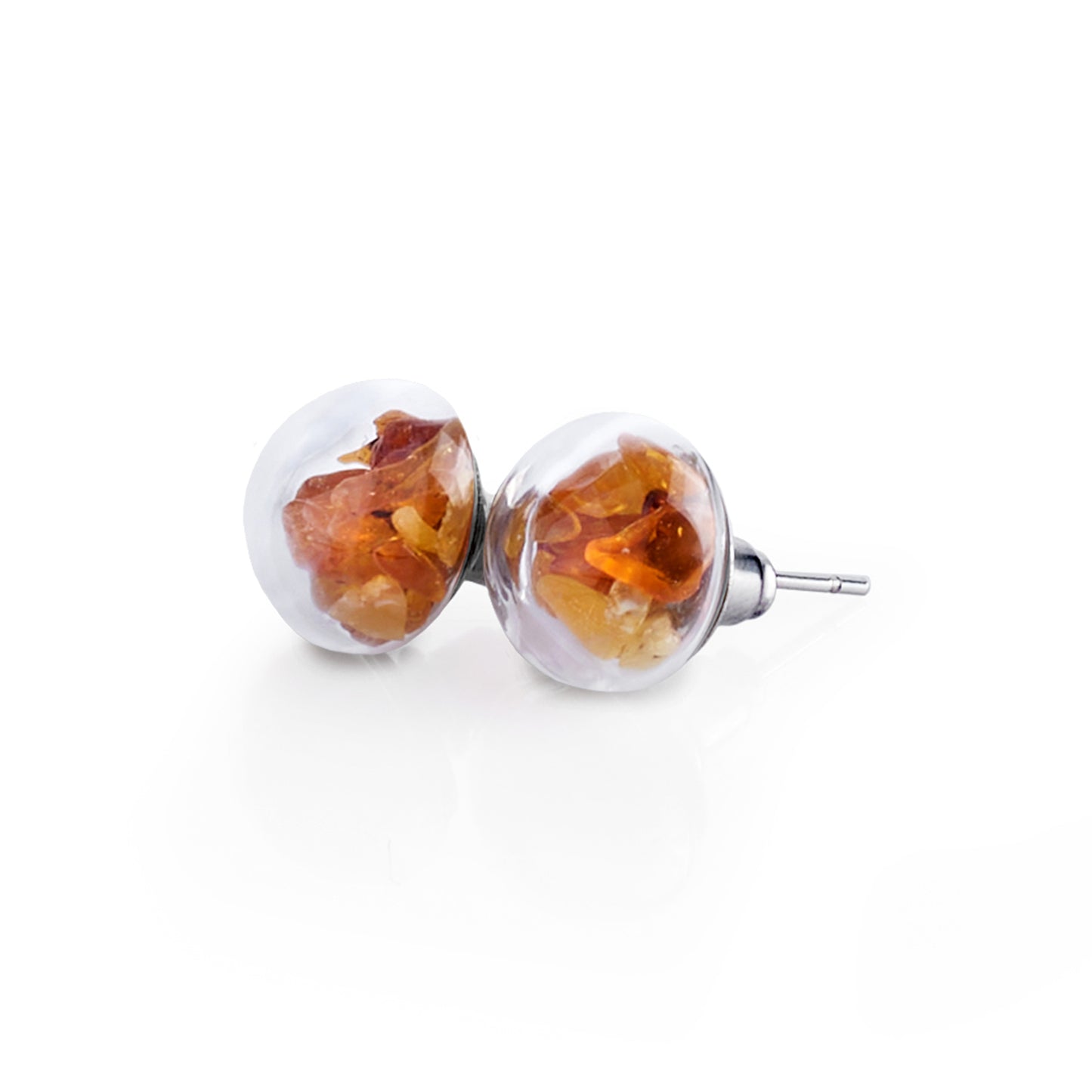 Handmade glass stud earrings with amber stones encased in glass, symbolizing love and passion, in hypoallergenic stainless steel settings