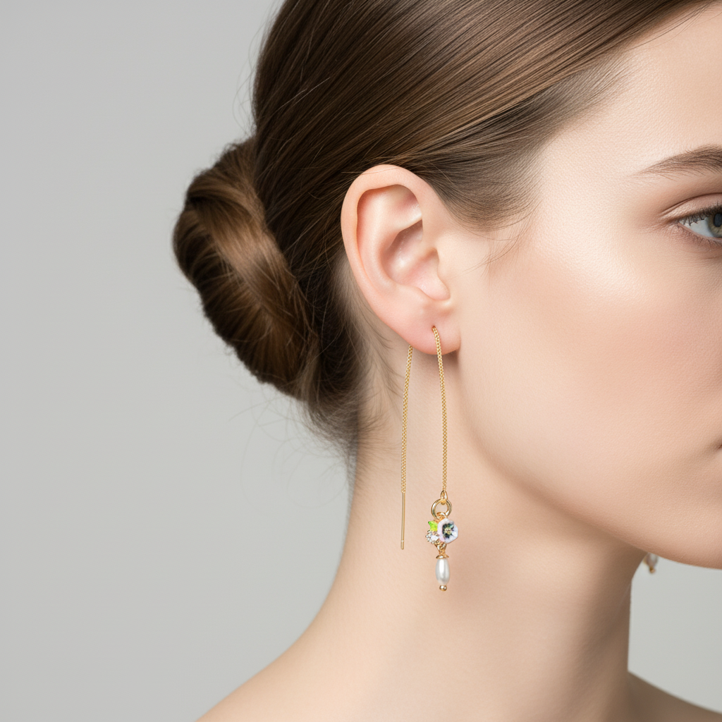 Perveriami auskarai su grandinėle ir rožinėmis gėlėmis